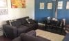 Weekender - Accommodation in Bremer Bay - 21 Barbara Street. Loungeroom has 3 seater and 2 seater couches, TV, DVD and fireplace