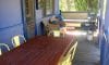 Weekender - Accommodation in Bremer Bay - 21 Barbara Street. Outdoor verandah features dining area, outdoor lounge area and BBQ